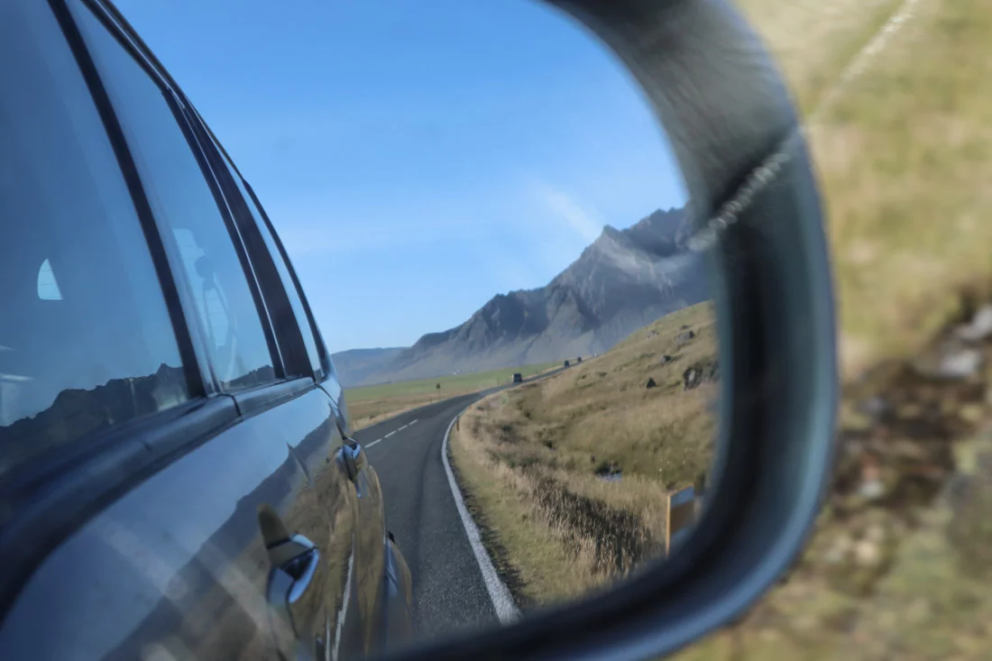 Car wing mirror, Iceland landscape